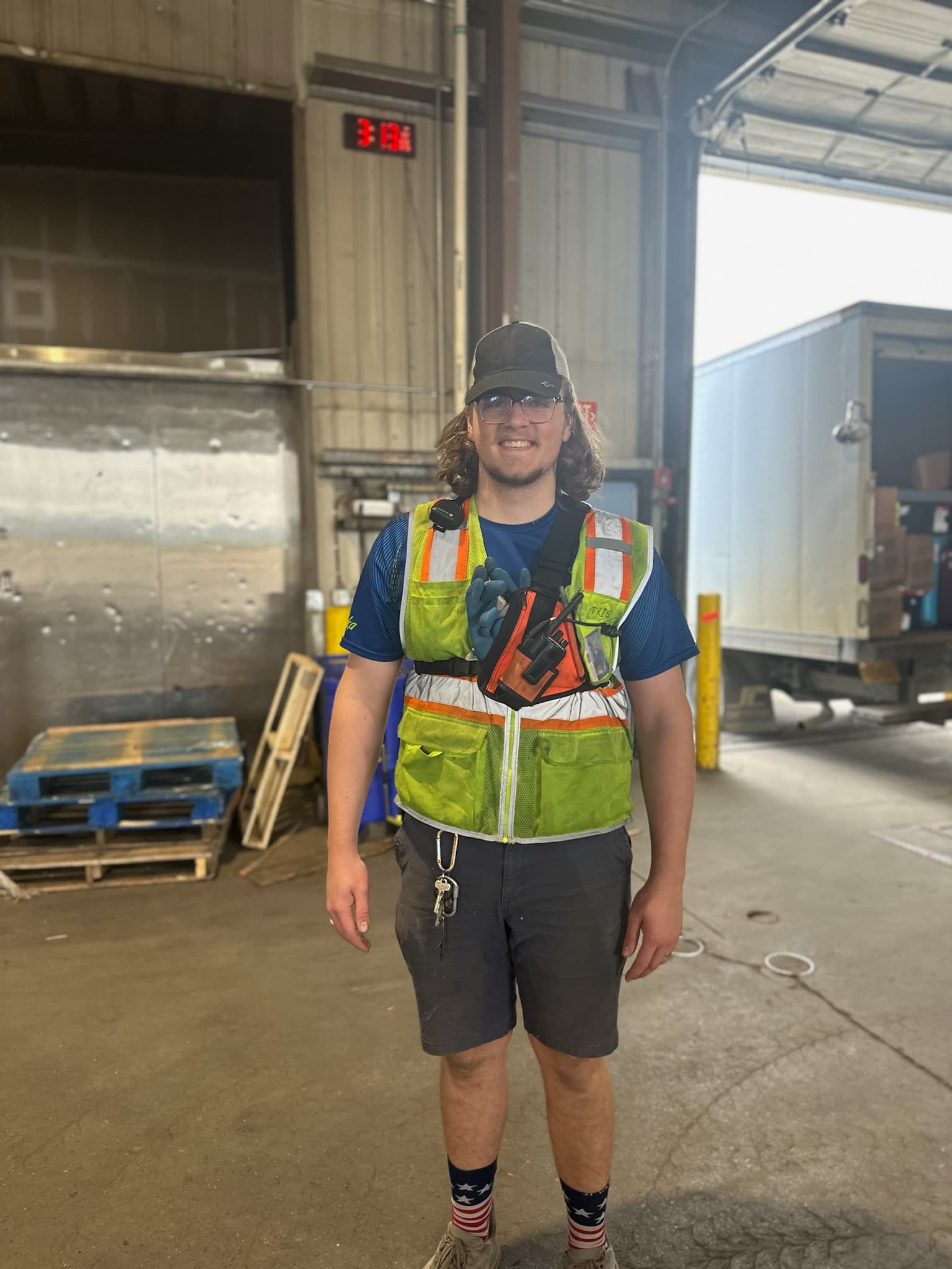 Alaska Air Cargo ramp service agent in vest