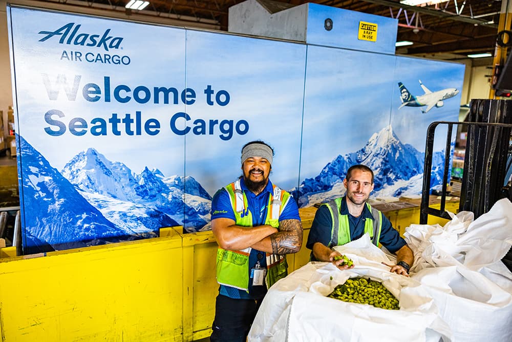 Alaska Air Cargo Seattle station with bags of fresh hops
